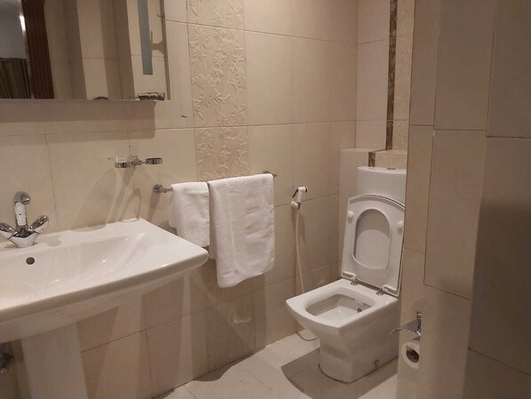 Hair dryer, towels, soap, shampoo