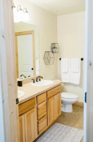 Jetted bath, hair dryer, towels, soap