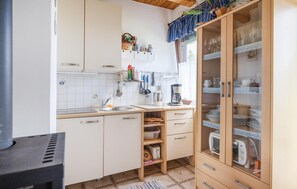 Fridge, stovetop, coffee/tea maker