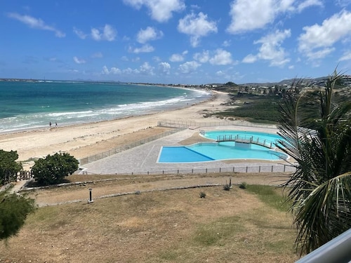 Wonderful 2 room Duplex right on the beach with frontal sea views in Orient Bay