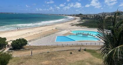 Wonderful 2 room Duplex right on the beach with frontal sea views in Orient Bay