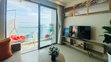 Family Apartment | Living area | 32-inch Smart TV with digital channels