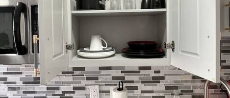 Fridge, microwave, stovetop, coffee/tea maker