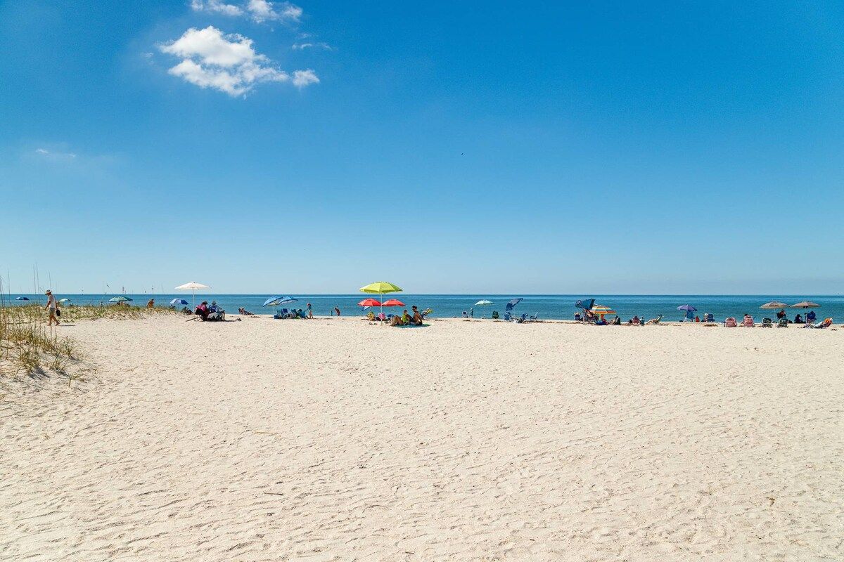 Spend the day at Nokomis Public Beach under an umbrella with good book and cold beverage