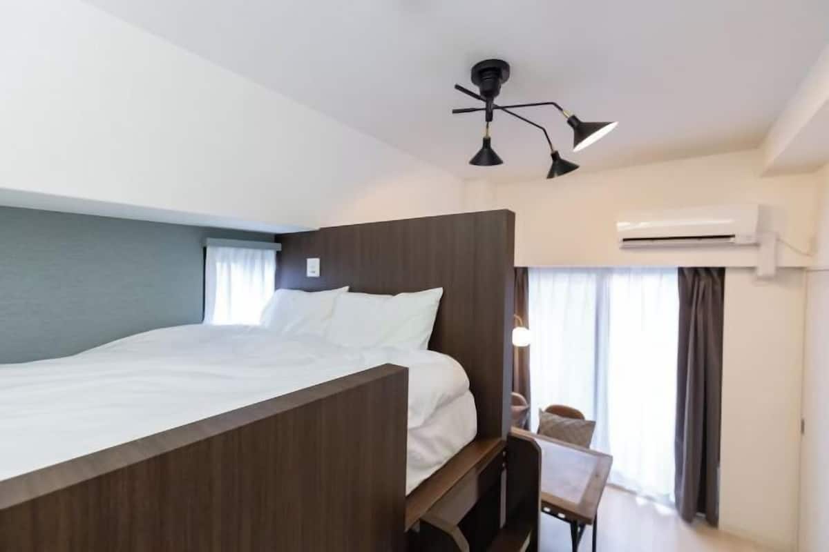 1 chambre, rideaux occultants, Wi-Fi gratuit