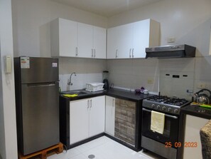 Fridge, microwave, dishwasher, coffee/tea maker