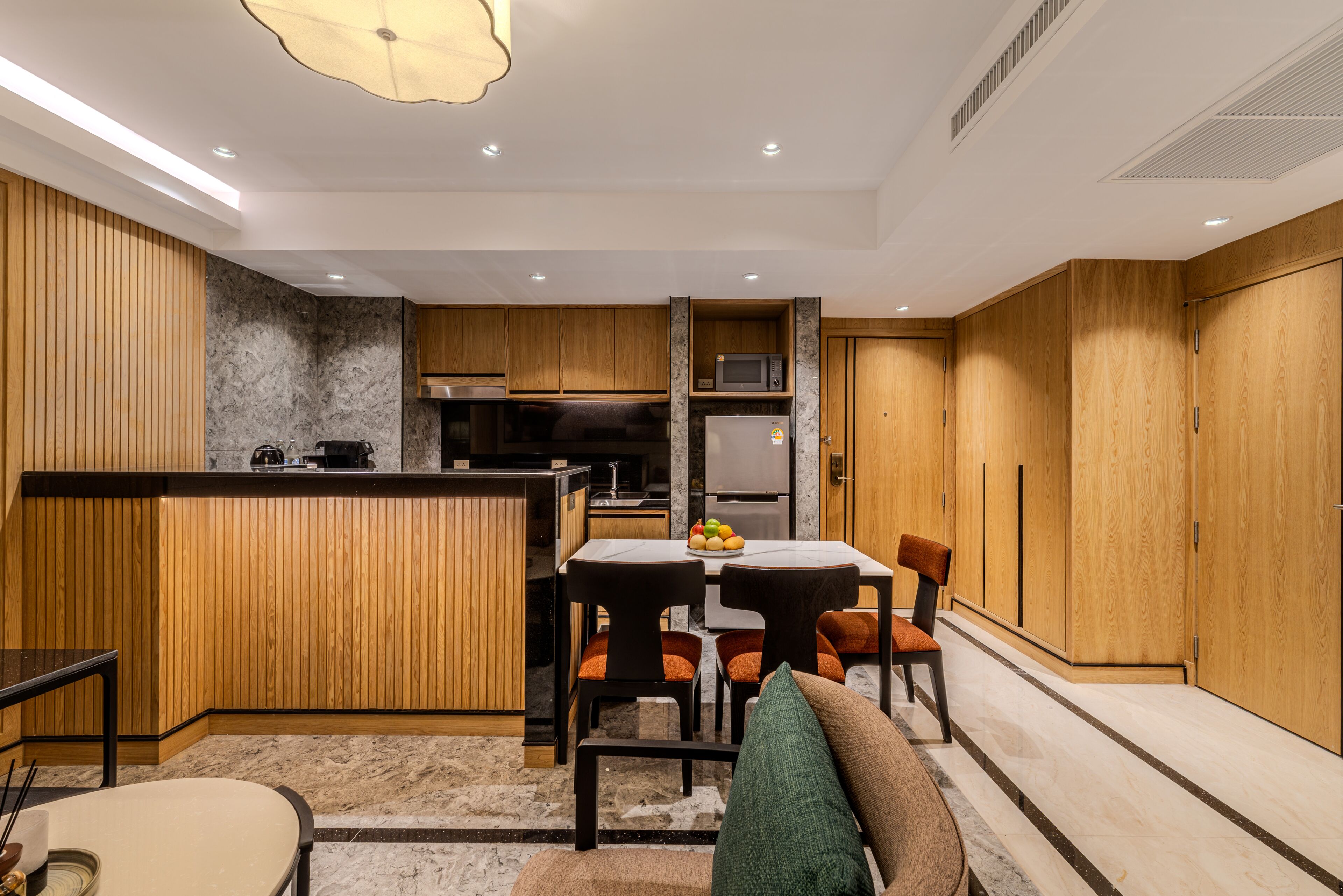Fridge, microwave, electric kettle, dining tables