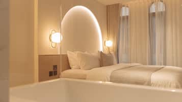 Premium Room with Bath or Soaking Tub | Bathroom | Combined shower/tub, rainfall showerhead, free toiletries, hair dryer