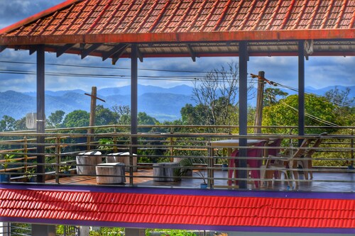 House in the hill homestay homestay is located on the hilltop .