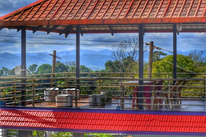 House in the hill homestay homestay is located on the hilltop .