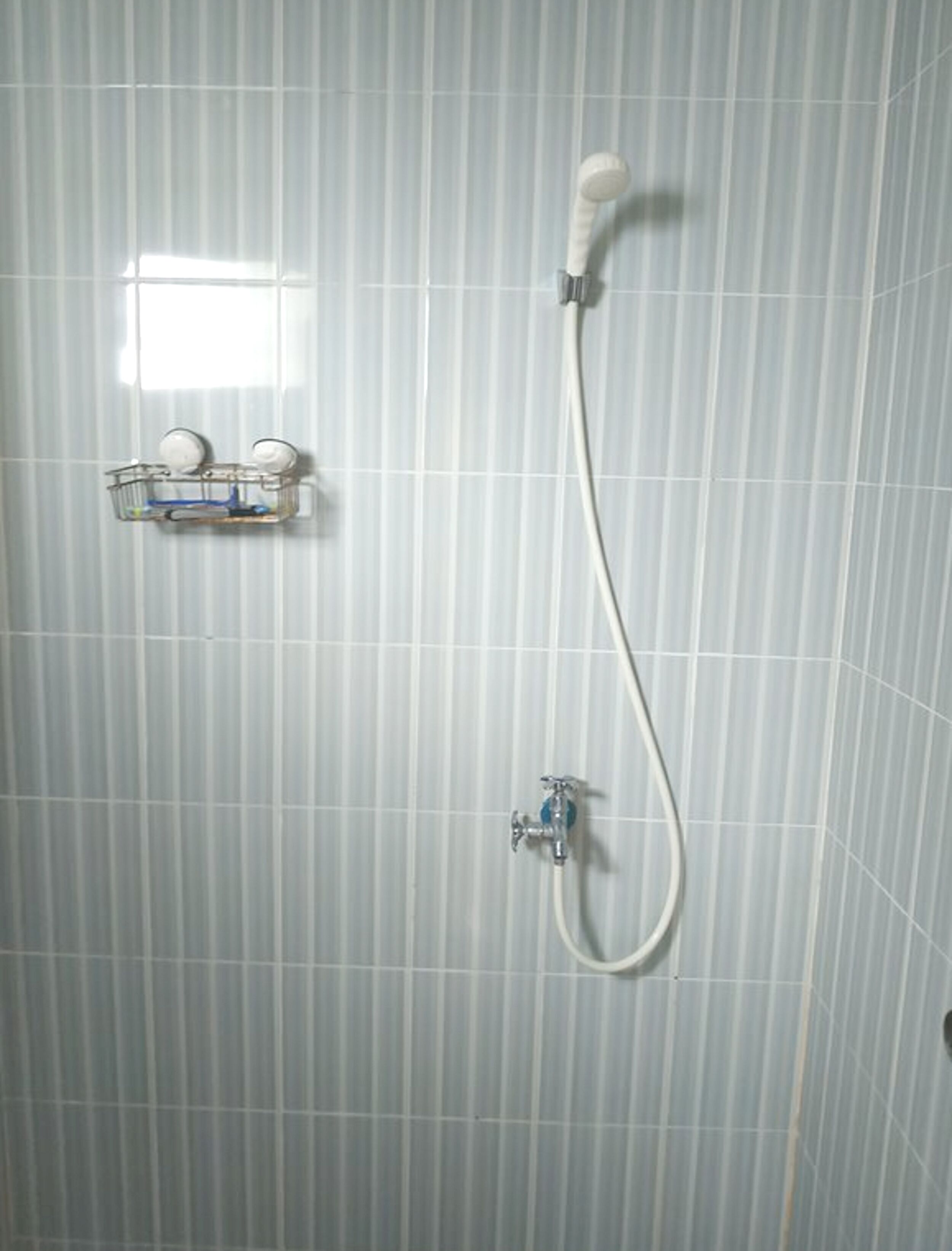 Kamar Double Deluks | Kamar mandi | Shower dan handuk
