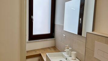 Shower, free toiletries, hair dryer, bathrobes