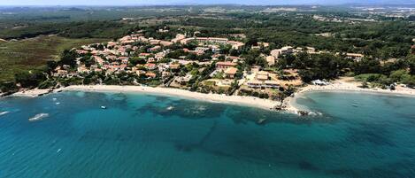 On the beach, sun loungers, beach towels