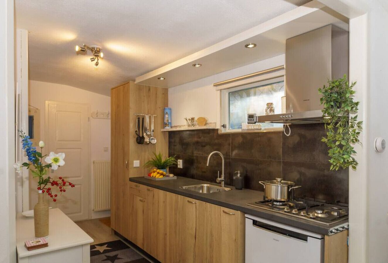 Fridge, stovetop, coffee/tea maker, cookware/dishes/utensils