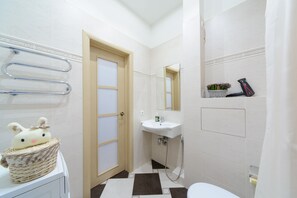 Classic Apartment | Bathroom | Bathtub, hair dryer, towels, soap - Luxurious apartment  in Minsk (Minsk)