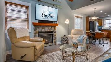 Smart TV, fireplace, books