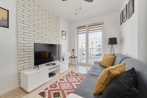 Apartamento, 1 quarto, sacada | Sala de estar