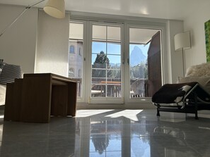 Panoramic Apartment | Living area | 32-inch flat-screen TV with cable channels, heated floors - Place to relax (Zermatt)