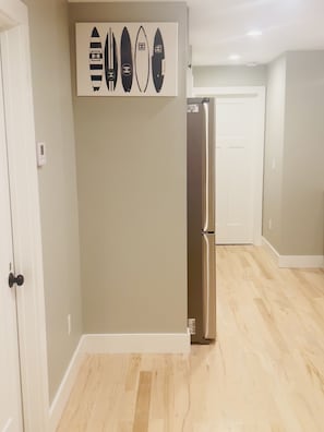Enjoy cooking in this well-equipped kitchen with a refrigerator and ample counter space.