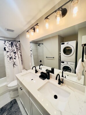 Shower, hair dryer, bidet, towels