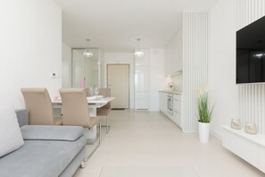 Apartment, 1 Bedroom, Balcony | 1 bedroom, desk, bed sheets - Zabłocie Apartments Cracow by Renters (Kraków)