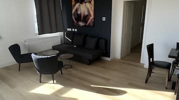 Appartamento Comfort | Area soggiorno | TV LCD 40 pollici con canali satellitari