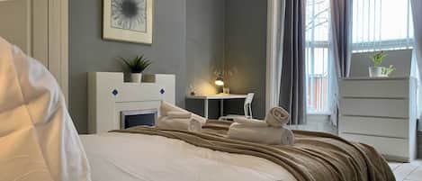 6 habitaciones, tabla de planchar con plancha, wifi y ropa de cama