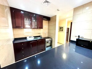 Apartment (1 Bedroom) | Private kitchen | Microwave, oven, cookware/dishes/utensils - Luxury 1B With Balcony at Ras Al Khaimah (Ras Al Khaimah)