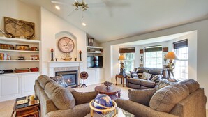 A spacious living room with a fireplace, comfortable sofas, and a globe on a stand. - 6 Mi to Dtwn Yakima: Central Washington Home (Yakima)