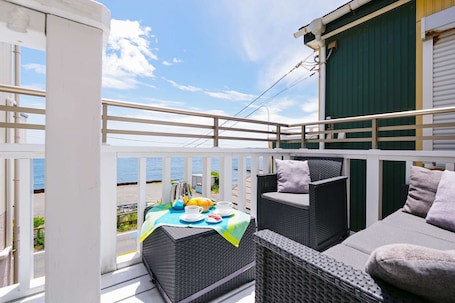 Terrace/patio. Rental villa with private sauna with ocean view