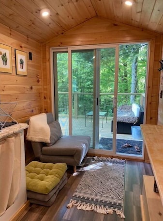 Living area. Mountain & Pond View tiny Home