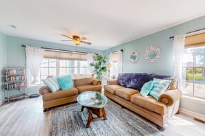 TV, DVD player, books, video library - The Reservation - dog-friendly home with fenced yard, deck, grill, & beach gear (Ocean View)