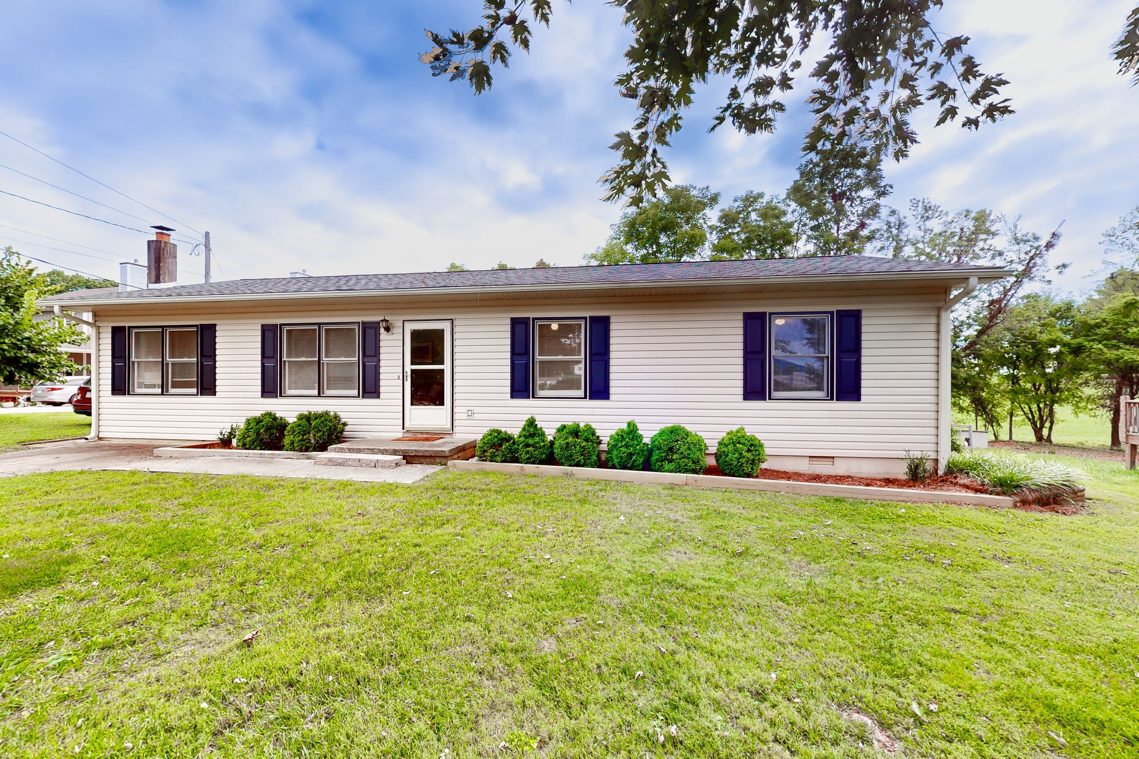 Well-located home in town with sunrise views, deck & great backyard