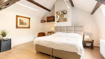 1 bedroom, desk, iron/ironing board, travel crib