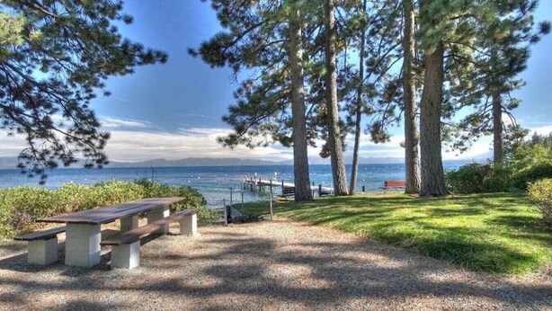 A picnic area with benches and a view of the sea. - Pet Friendly with Big Views! (Tahoe City)
