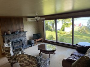 TV, fireplace, books, stereo