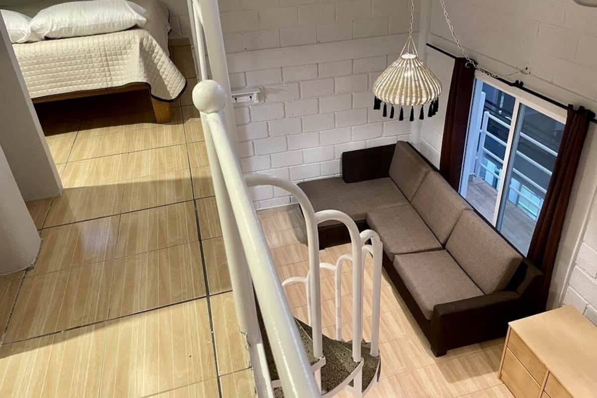 Standard Loft, 1 Bedroom, City View | Living area | 40-inch Smart TV with digital channels, Netflix, streaming services