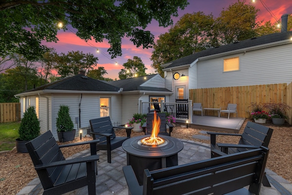 Backyard garden with a fire pit patio & deck