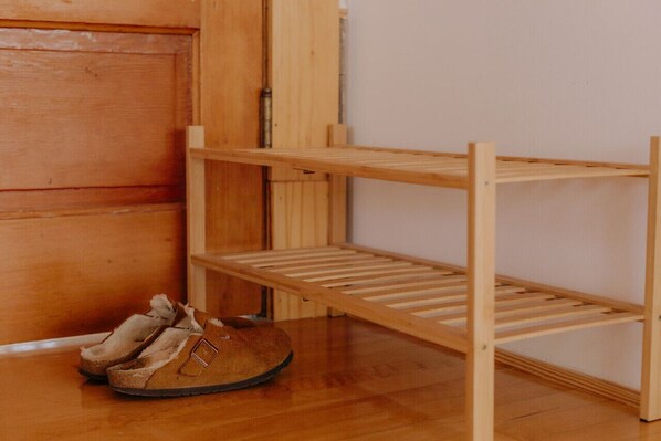 A wooden bunk bed with a pair of boots on the floor. - Urban loft style penthouse with incredible view (Pocatello)