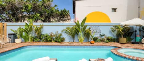 Outdoor pool, open 10:00 AM to 10:00 PM, pool umbrellas, sun loungers