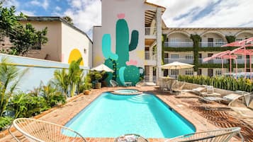 Outdoor pool, open 10:00 AM to 10:00 PM, pool umbrellas, sun loungers