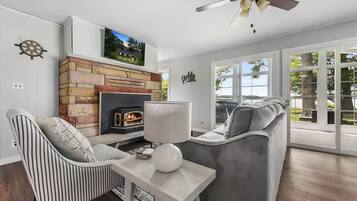Smart TV, fireplace, books