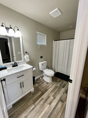 Hair dryer, towels, soap, shampoo