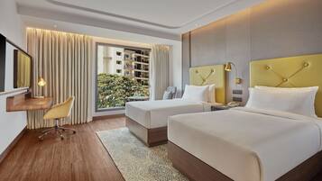 Hypo-allergenic bedding, minibar, in-room safe, desk