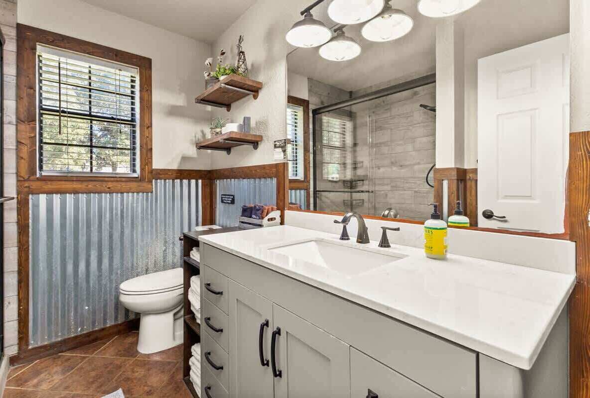 Shower, hair dryer, towels, shampoo