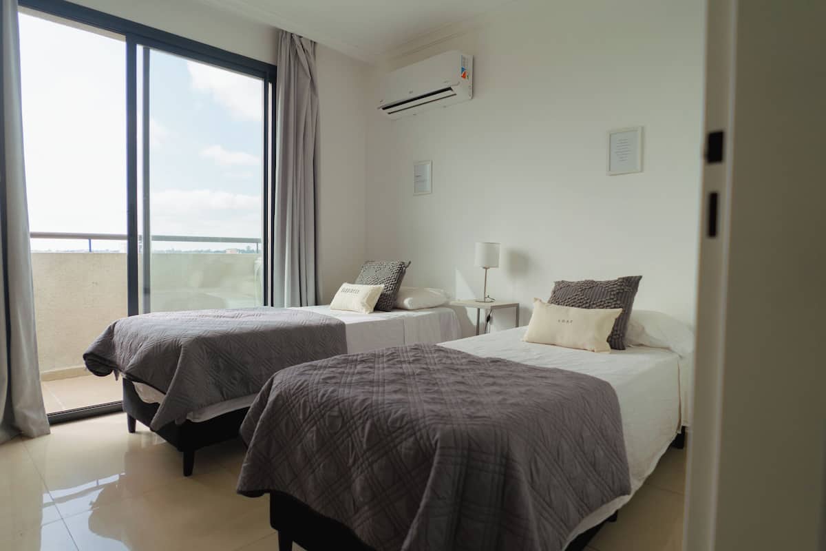 2 bedrooms, premium bedding, pillowtop beds, individually decorated