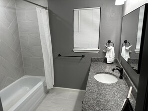 Shower, towels, soap, shampoo