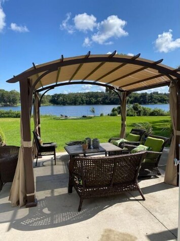 back deck - love seat and chairs -fire pit and dinning table 