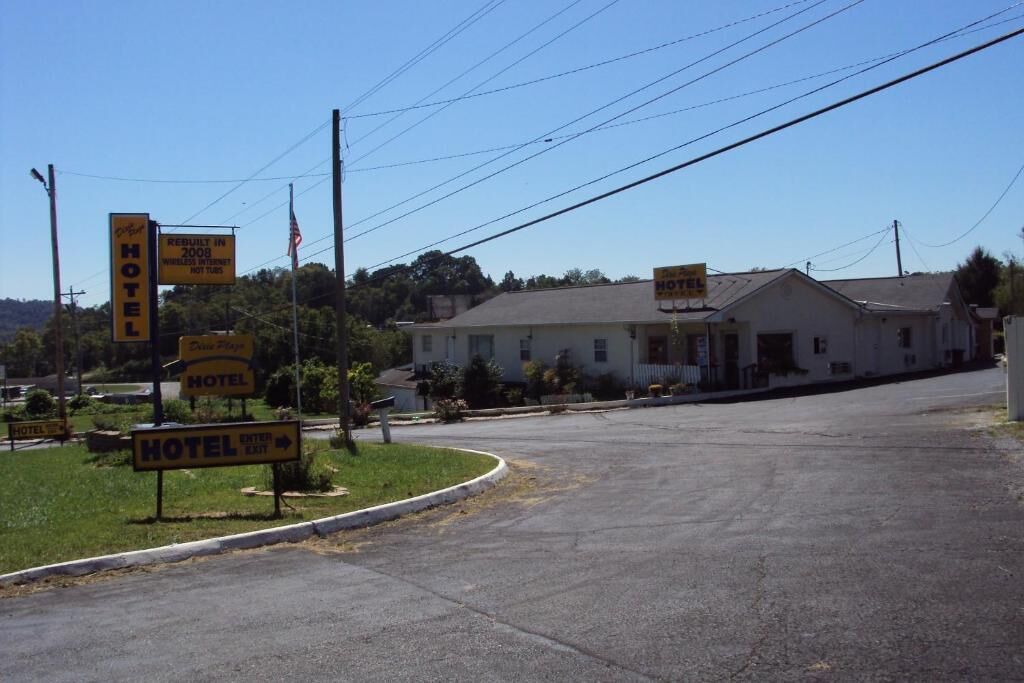 A motel with a sign indicating it was rebuilt in 2008 and offers wireless internet.