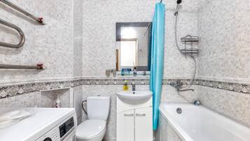 Hair dryer, towels, soap, shampoo